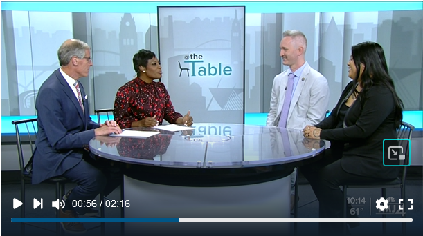 Lexi Lunger at a table with Charlie Nash of Cream City Foundation being interviewed by Charles Benson and Shannon Sims of TMJ4